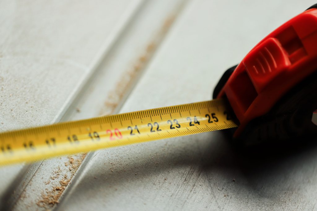 Tape measure on trim for a lineal footage estimate