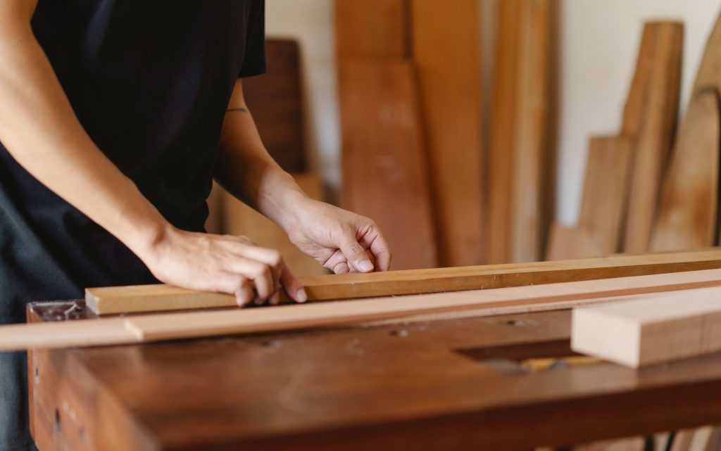 Woodworker handling trim